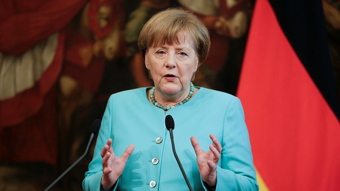 Merkel appelle l`Europe à défendre ses frontières